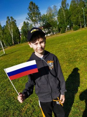 Участник акции Российский триколор